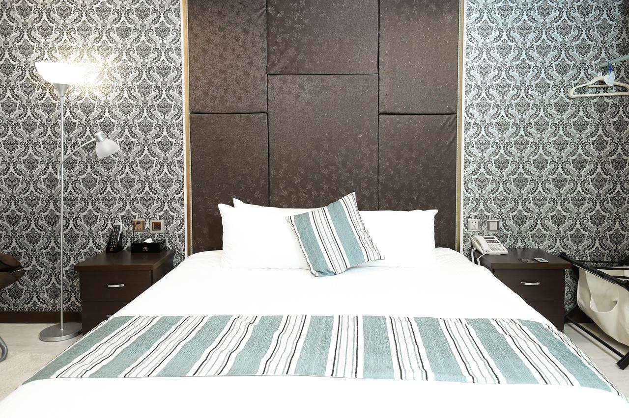 Hosin Hotel Тайджун Екстериор снимка